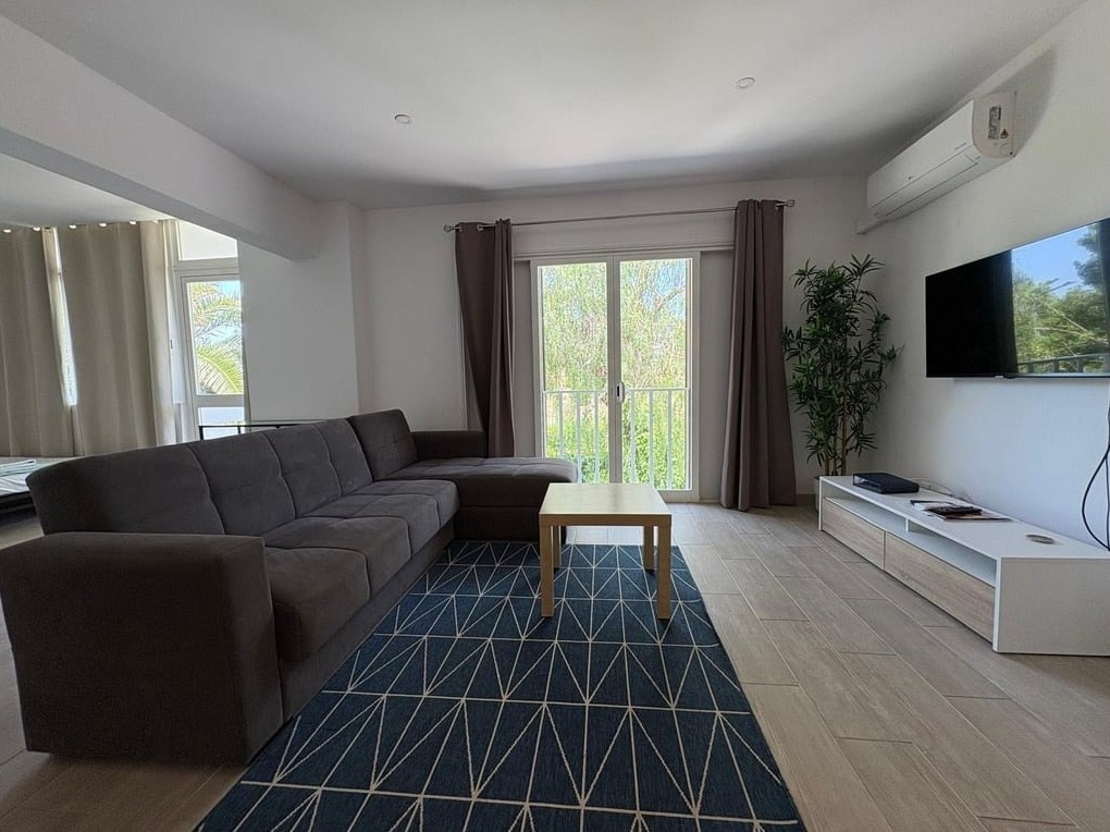 Sala de estar do Apartamento T1 Quinta dos Arcos, em Alvor