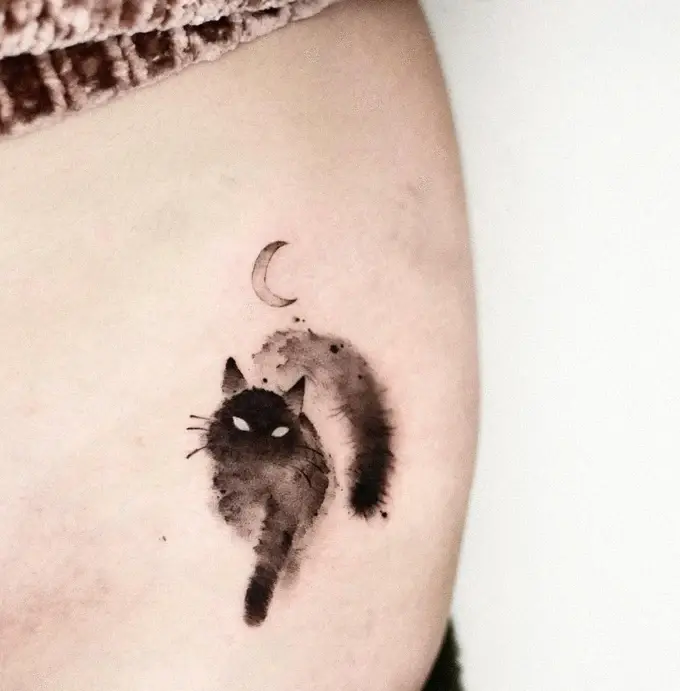 Black cat with a crescent moon