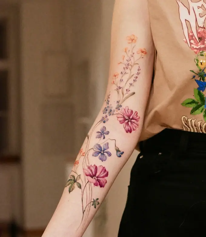 Flowers and butterflies along the arm