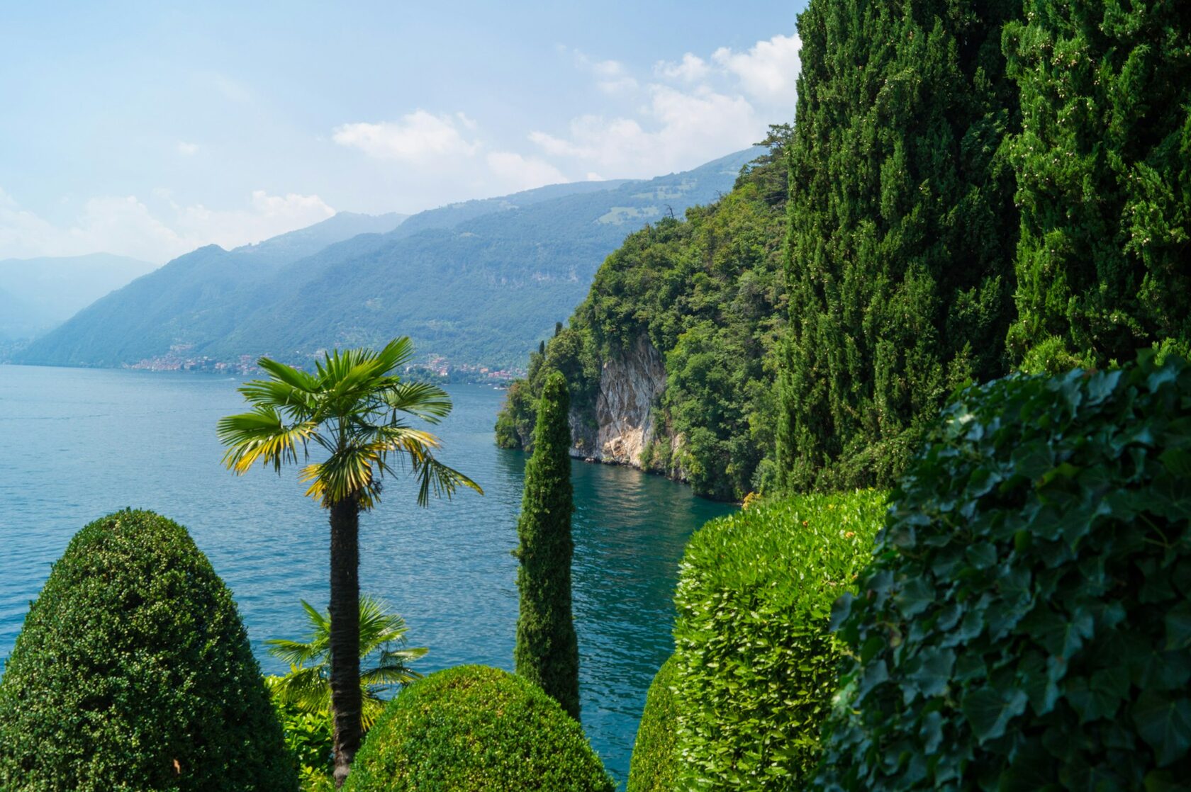 Villa del Balbianello's terraced gardens on its wooded point above Lake Como