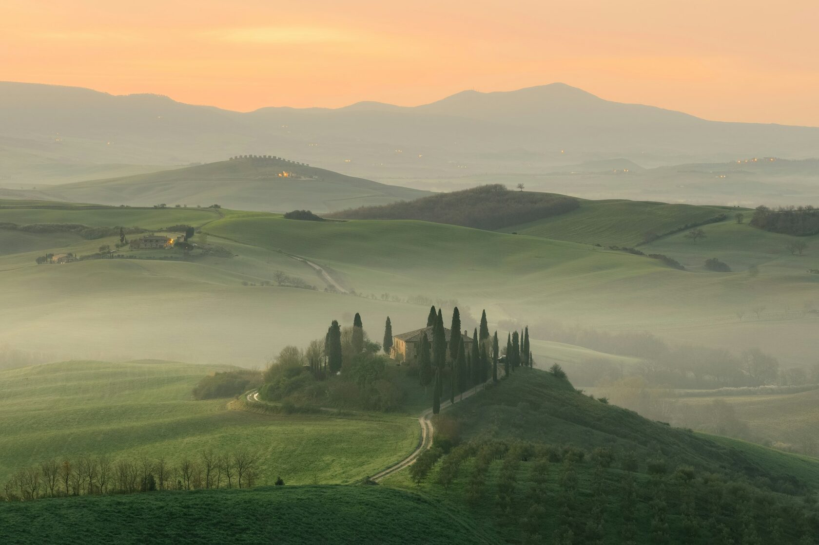 Tuscany Val d'Orcia cypress road at golden hour