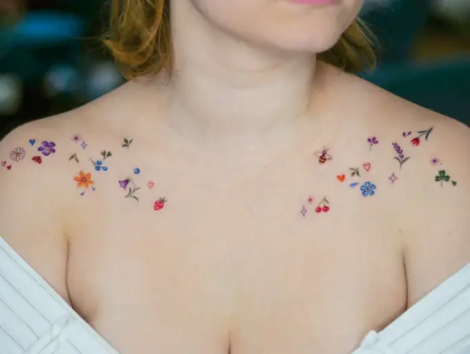 Small flowers along the collarbones