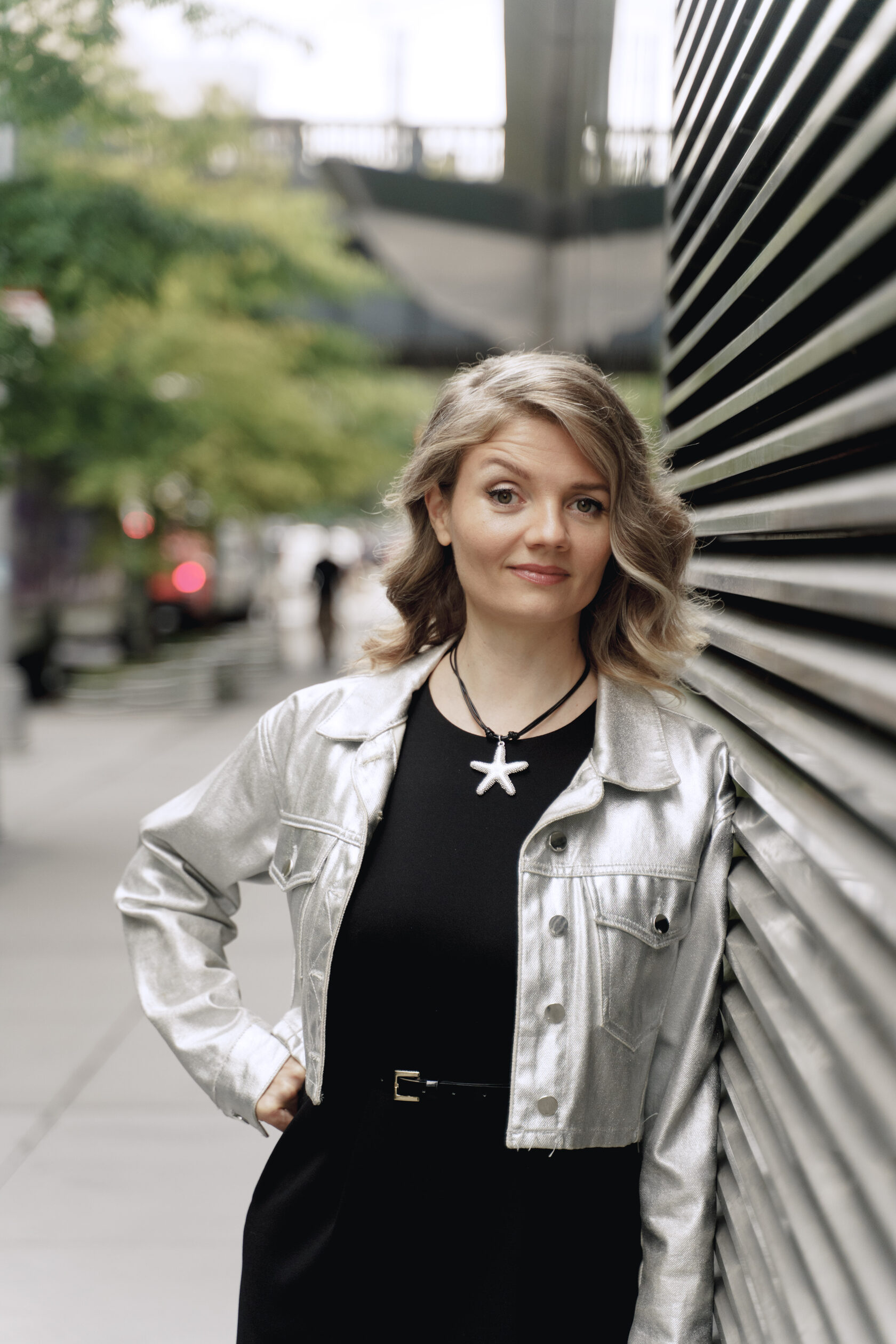 Anastasiia Yugozhiche, founder of PRIME, in a silver jacket in Chelsea