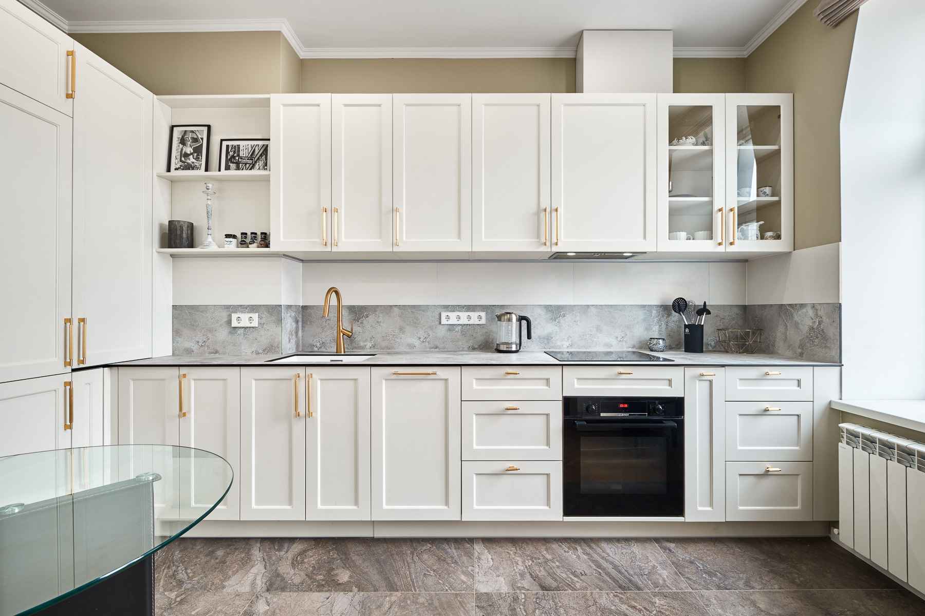 Front view of the kitchen in the apartment for rent at Čaka Street 26, Riga