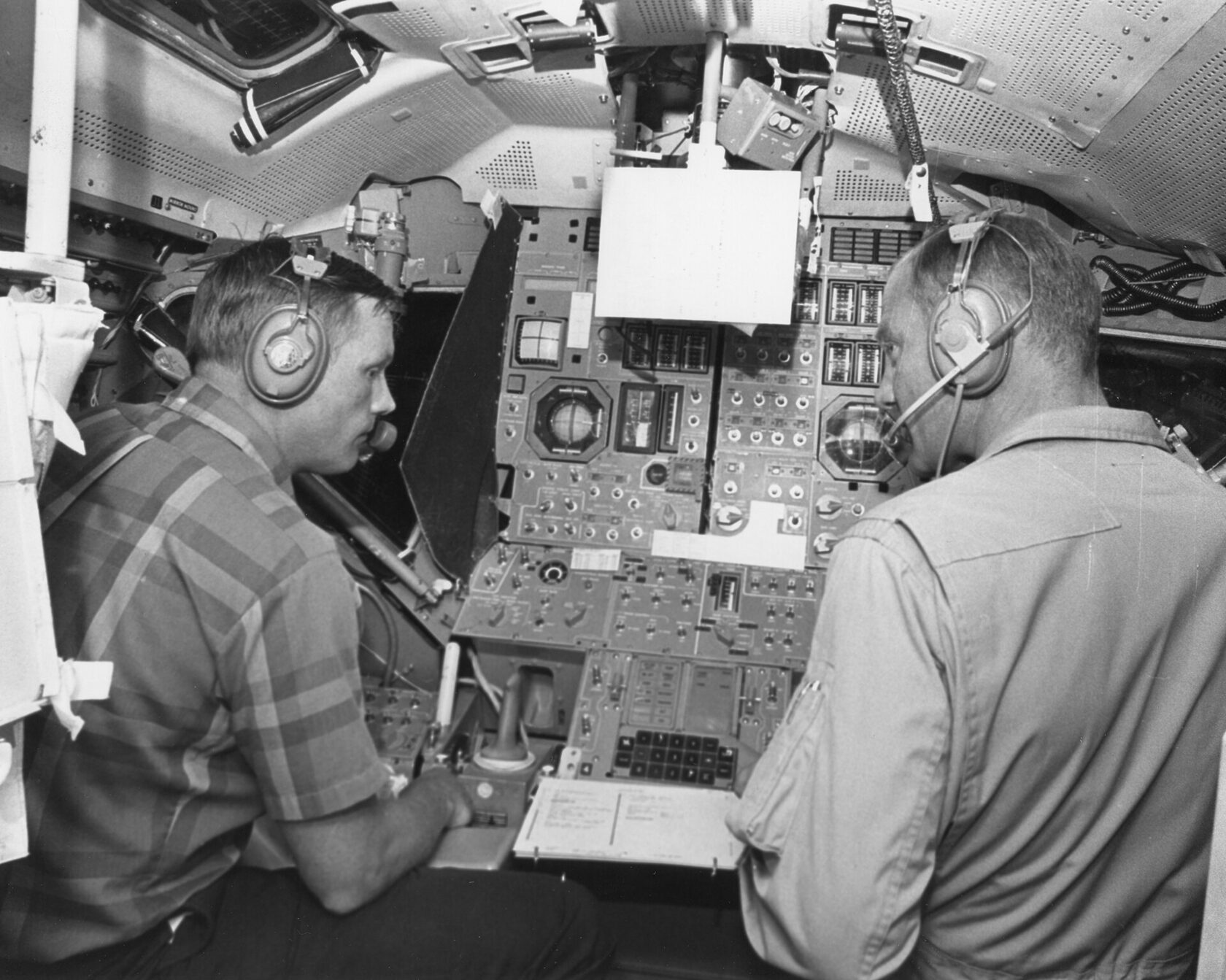 Archive photograph from 1969: Neil Armstrong and Buzz Aldrin rehearse the Apollo 11 landing in the Lunar Module simulator