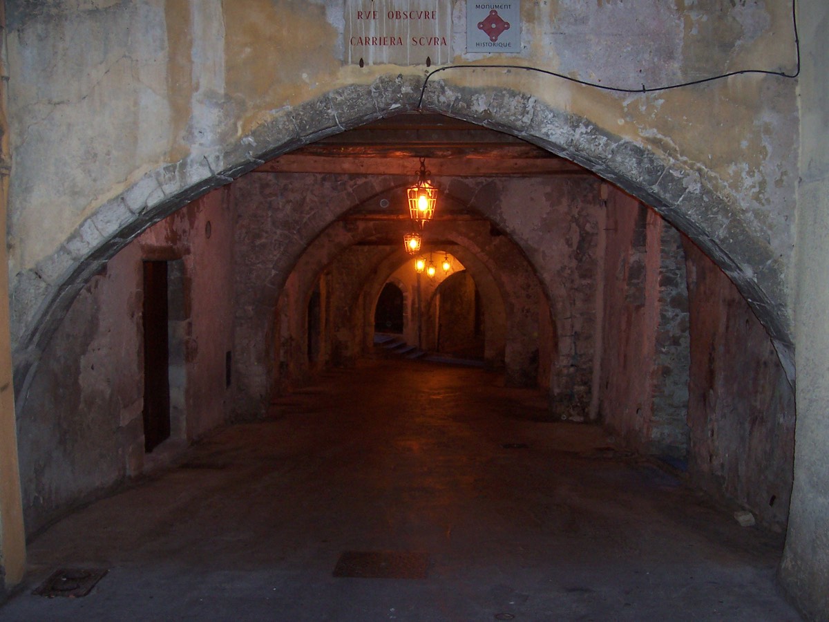 Vaulted passage on Rue Obscure in Villefranche-sur-Mer’s Old Town