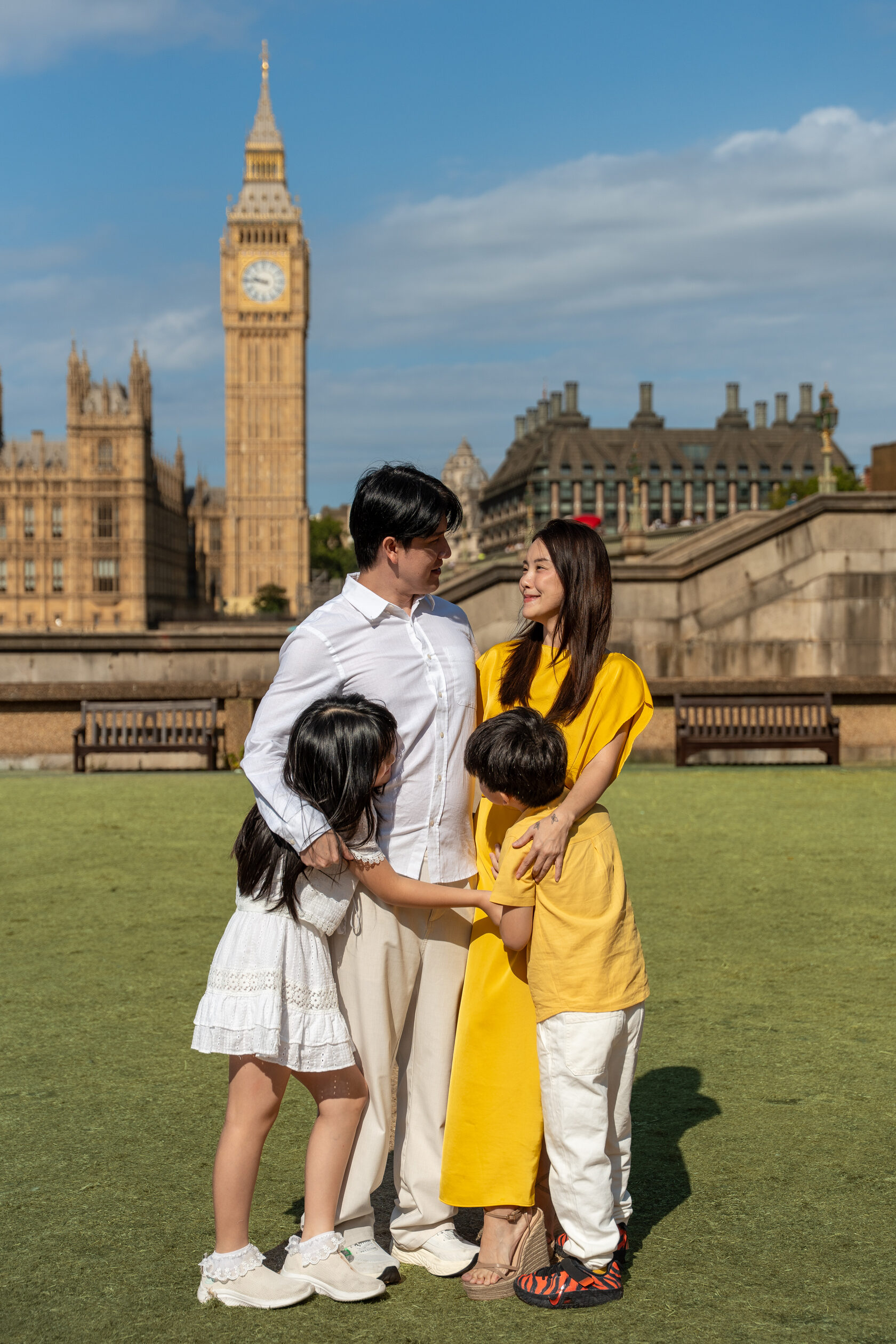 Parents embracing their children in Westminster
