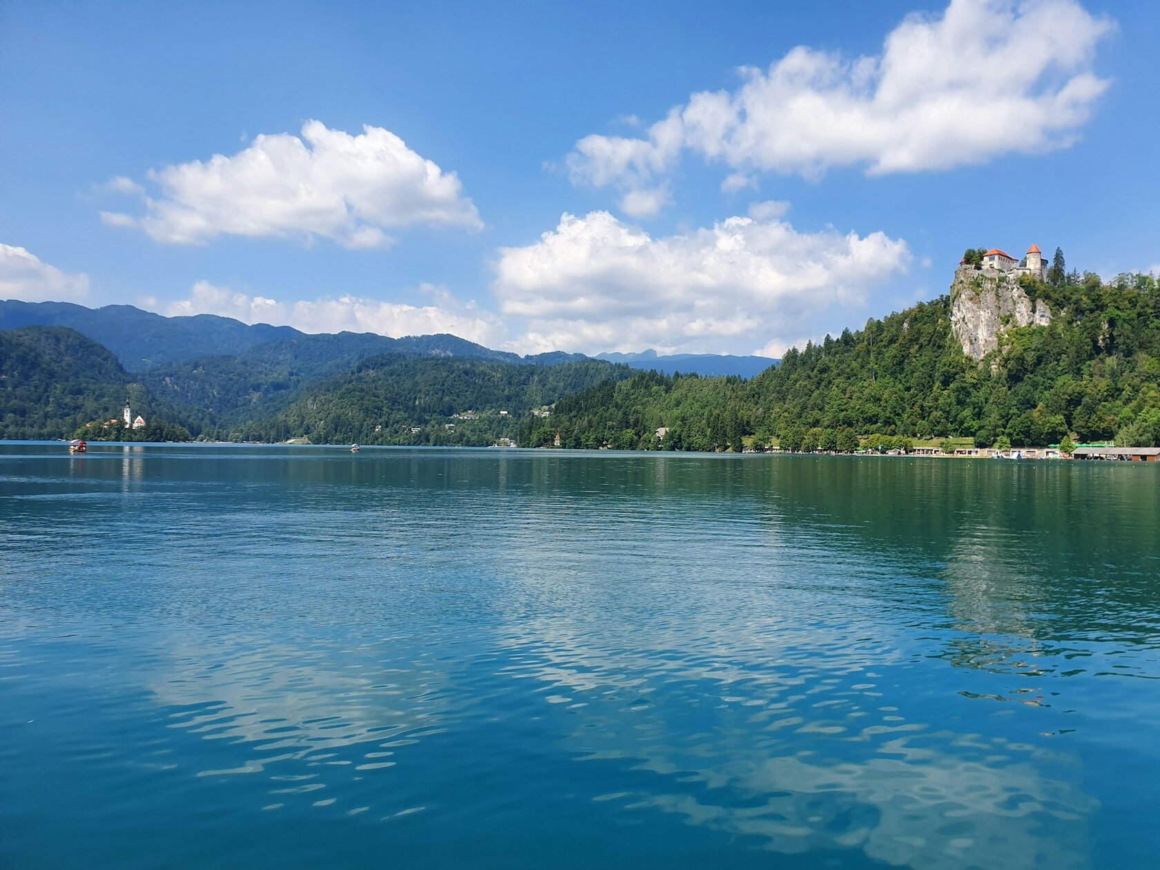 Sirmione's Scaliger Castle rising from clear blue water