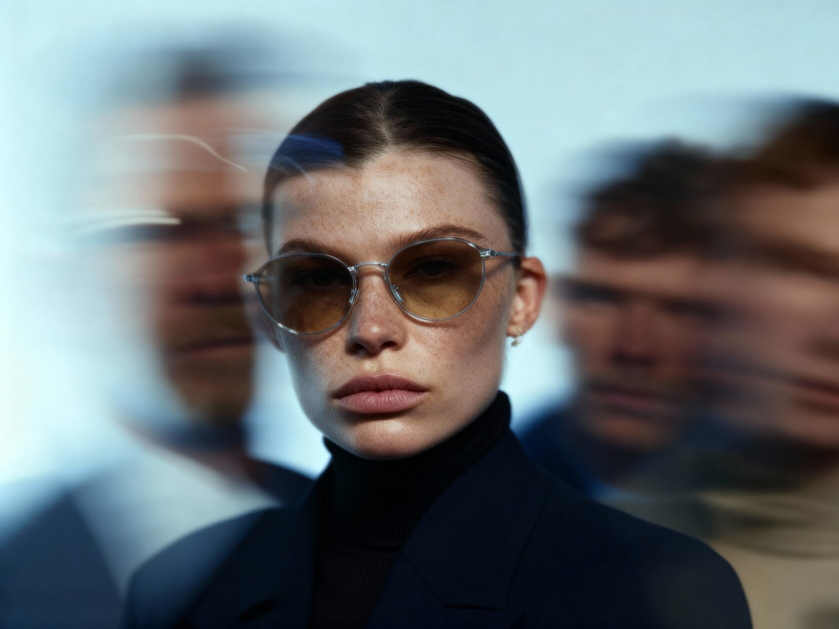 ZEISS Look and Feel study: central eyewear portrait surrounded by blurred figures