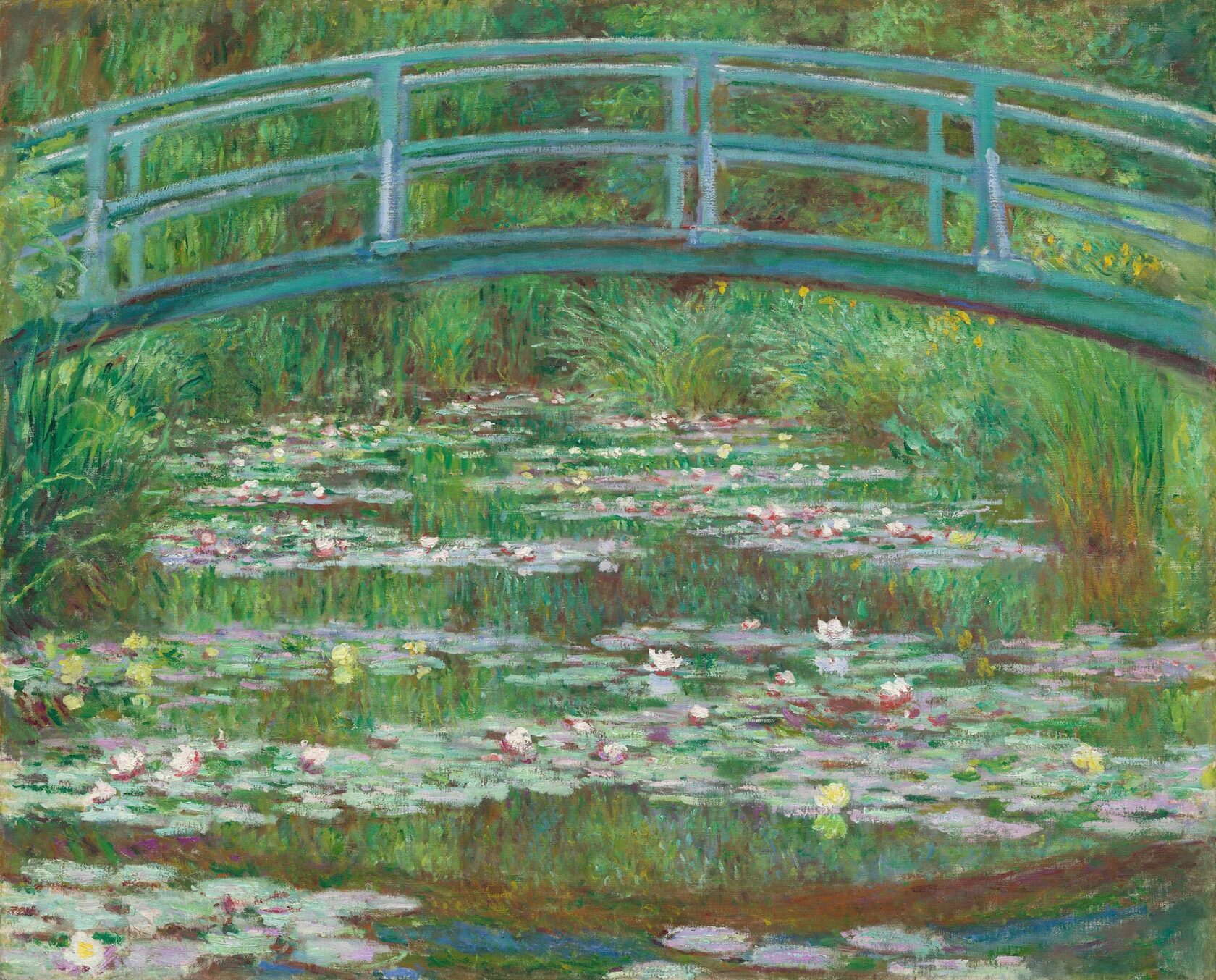 Monet's garden at Giverny with the green Japanese bridge over the water lilies