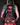 Vibrant color full back tattoo featuring a terrifying biomorphic entity tearing open a woman's back to reveal a monstrous maw with sharp teeth and a protruding tongue 711