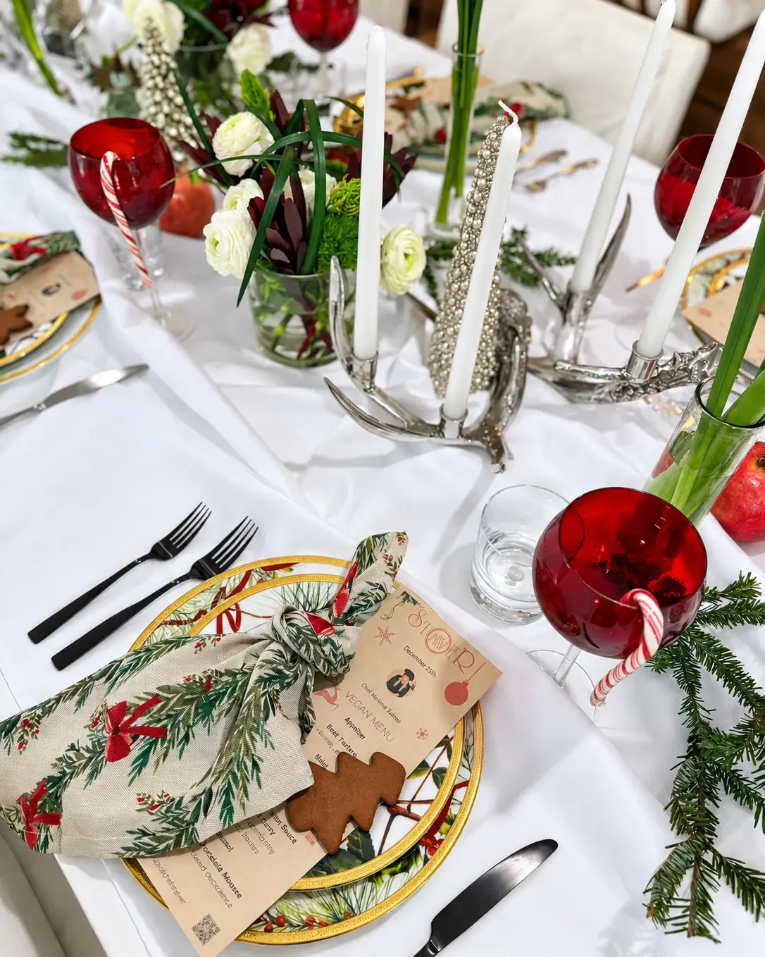 At every place: the menu card and a gingerbread cookie — a Christmas dinner at home by Miami private chef Marina Staver
