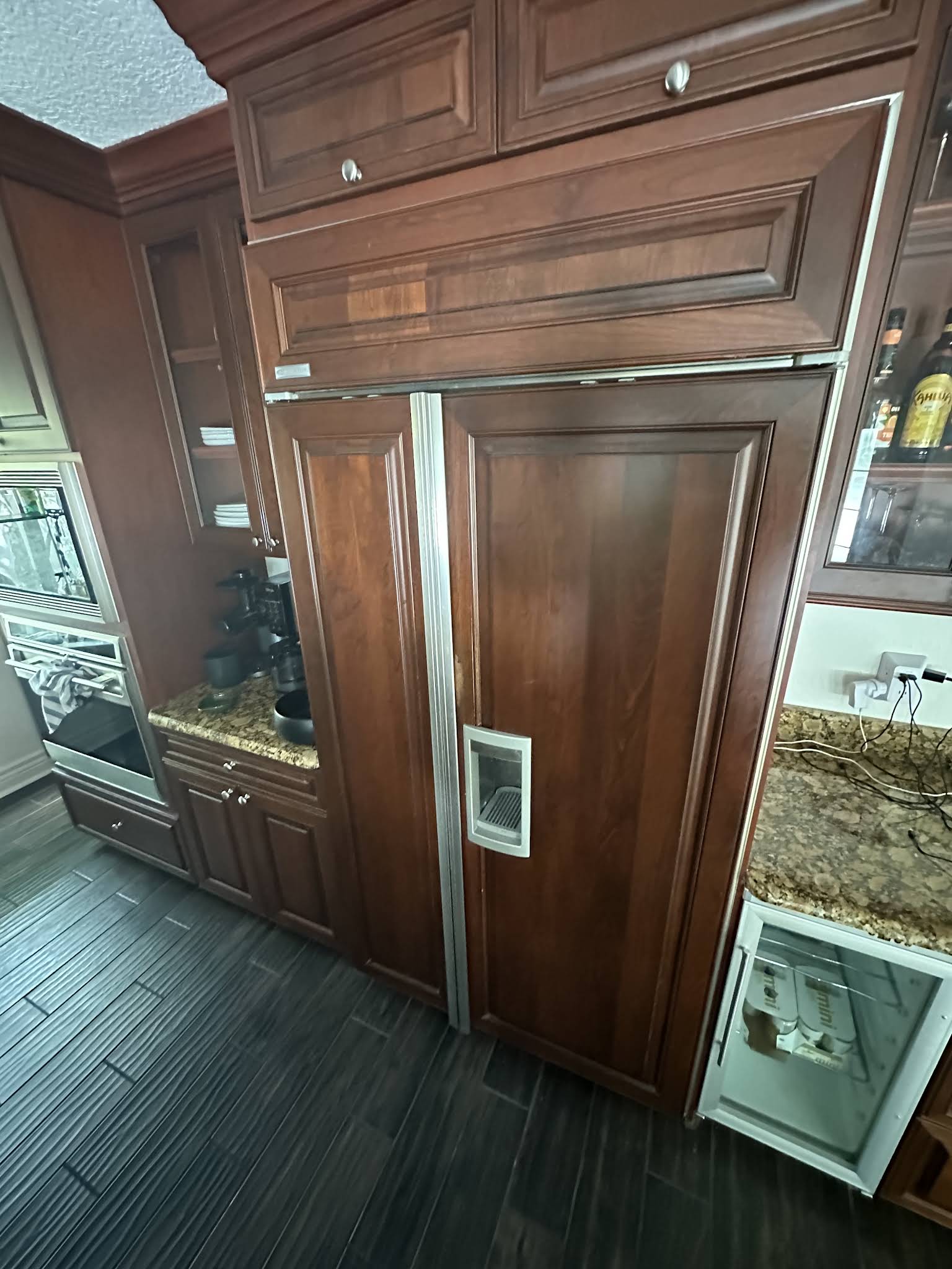 Built-in panel-ready refrigerator in a custom kitchen, the type of appliance AVM Services repairs in Odessa, FL