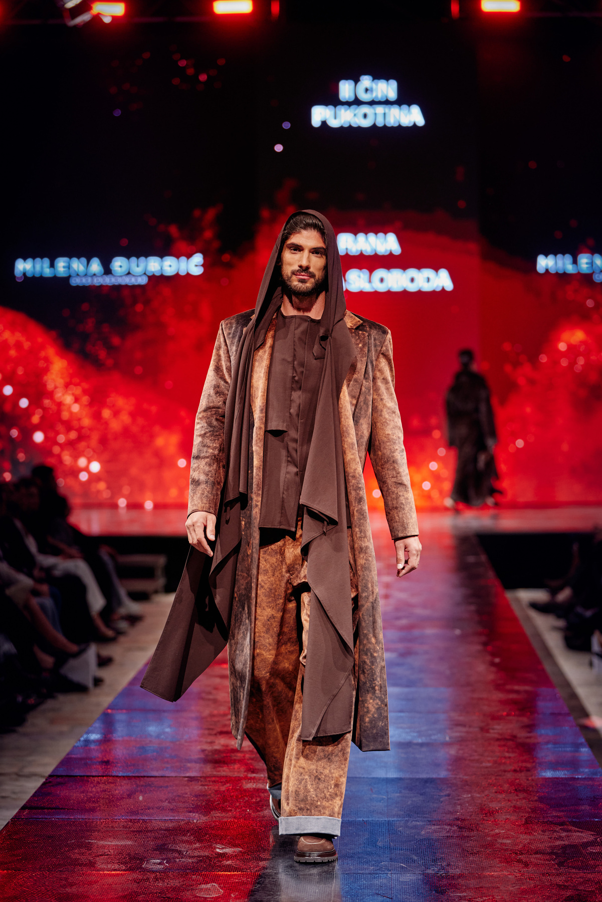 Brown layered menswear on the red runway