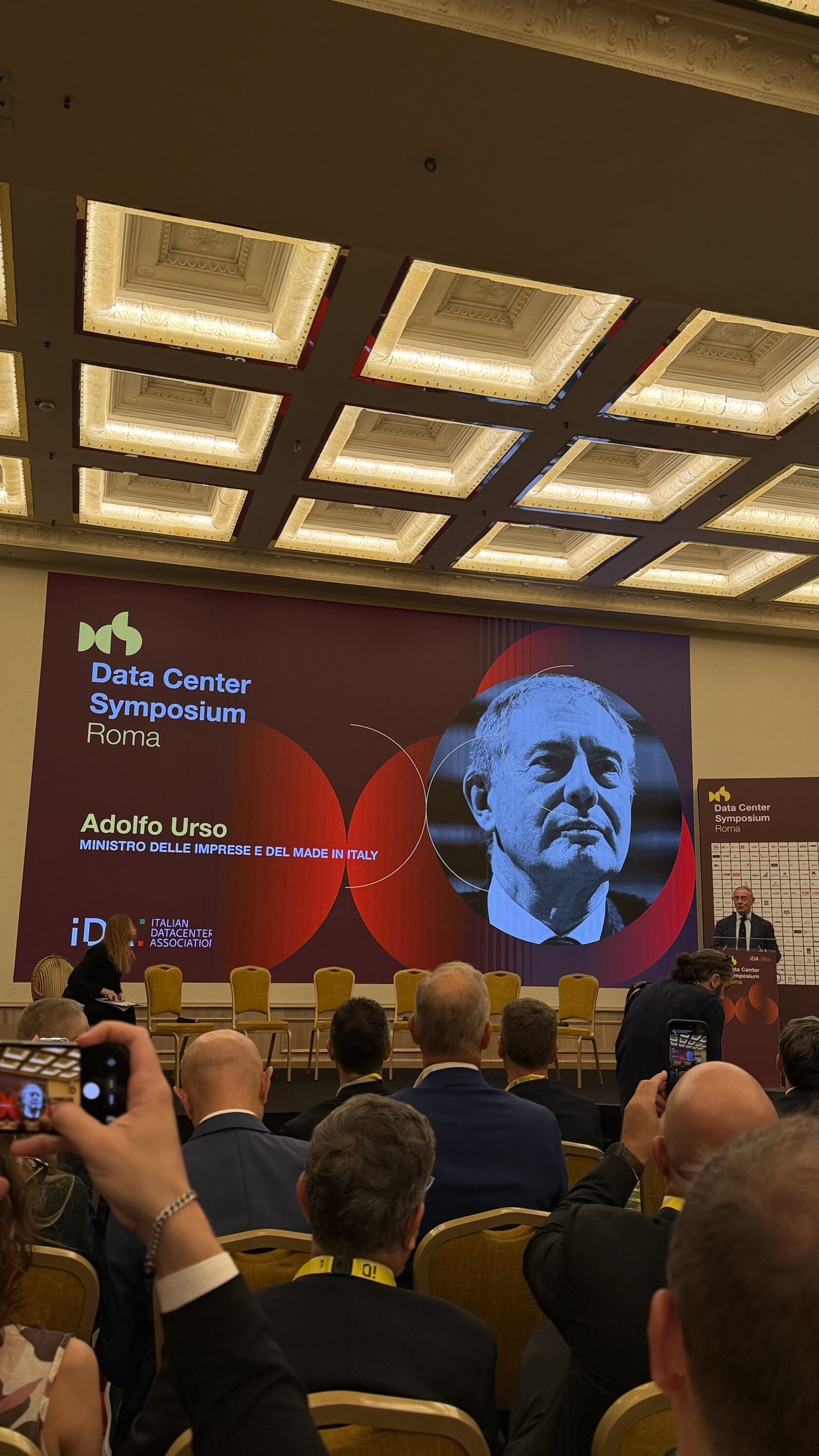 Session screen introducing Adolfo Urso