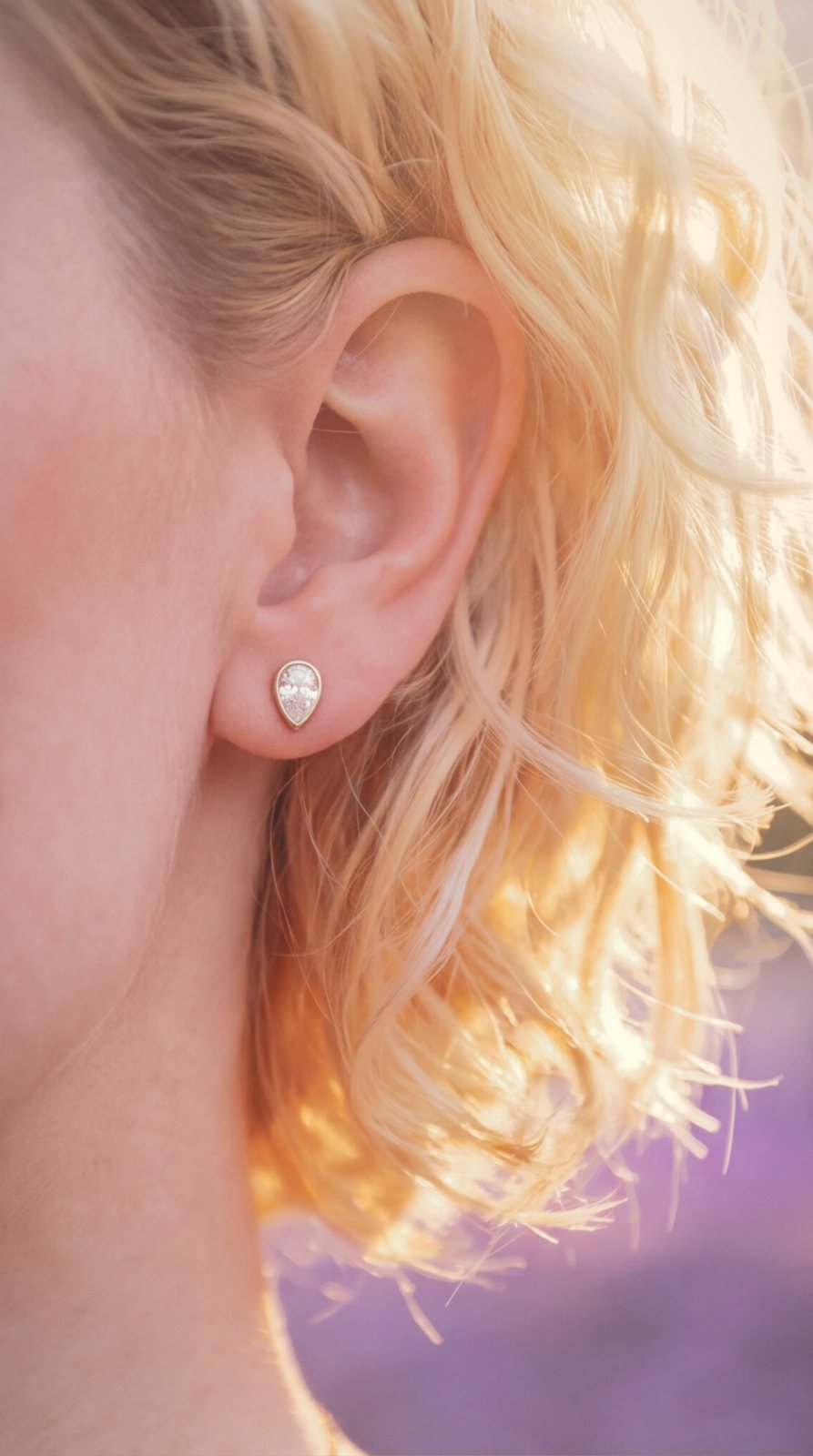Close-up of real brand earrings