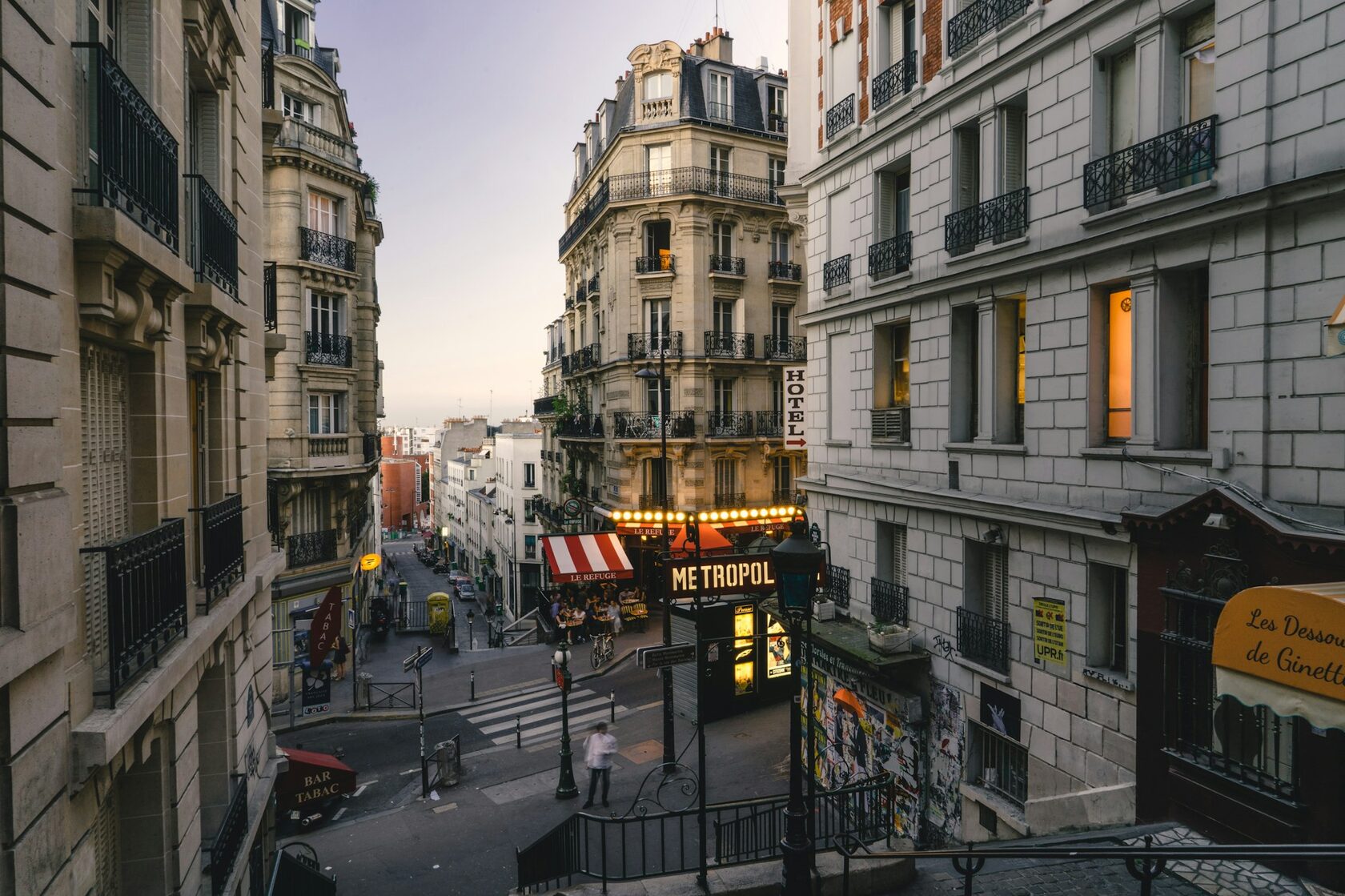 The west façade of Notre-Dame de Paris glowing at golden hour