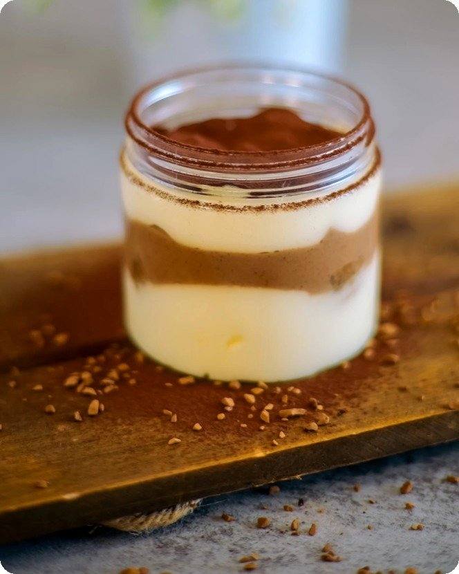 Tiramisu dessert jar with cocoa