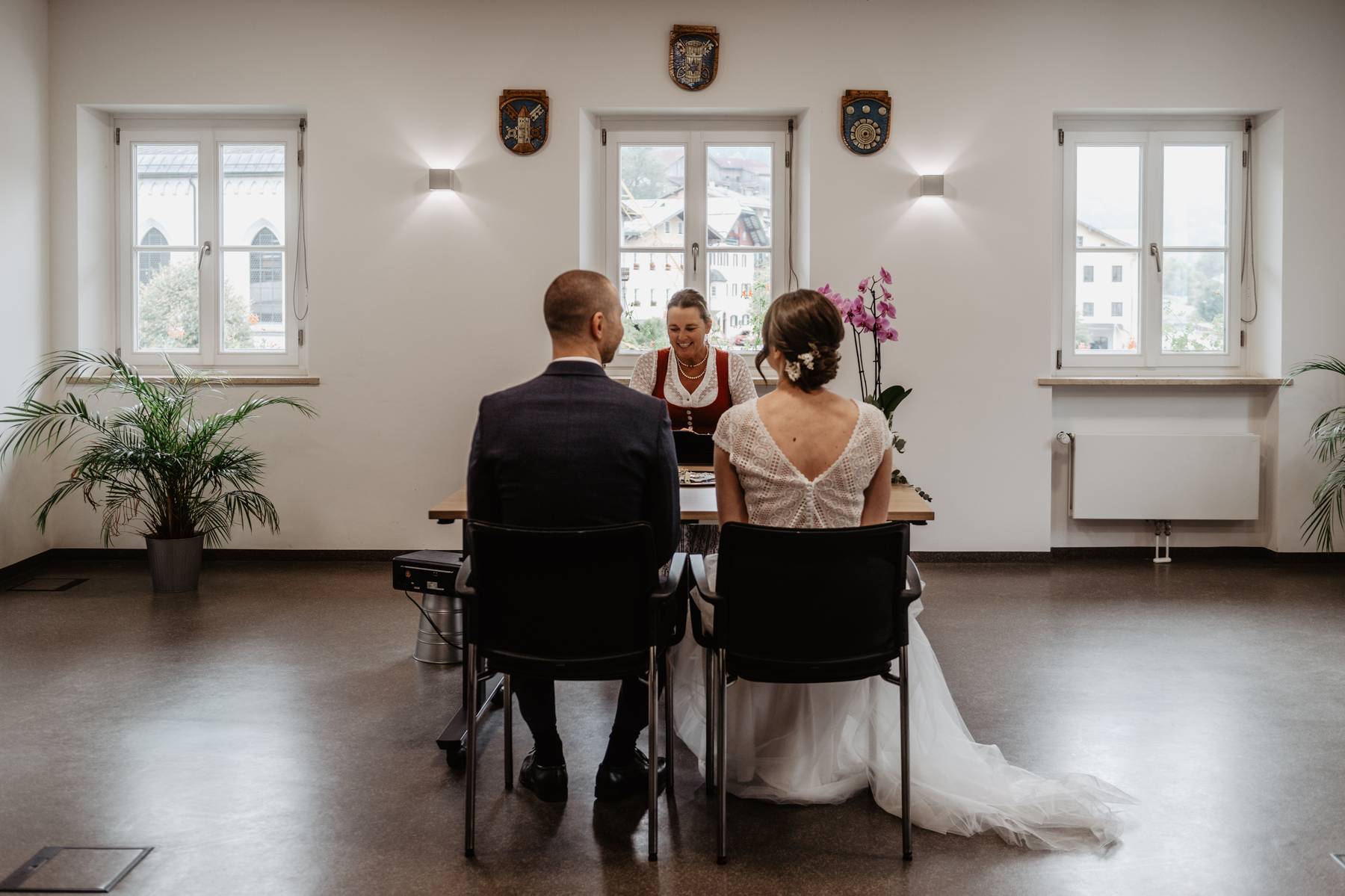 Couple seated together during their civil ceremony in Marktschellenberg