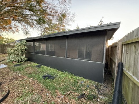 Bronze patio screen enclosure with dark kickplate