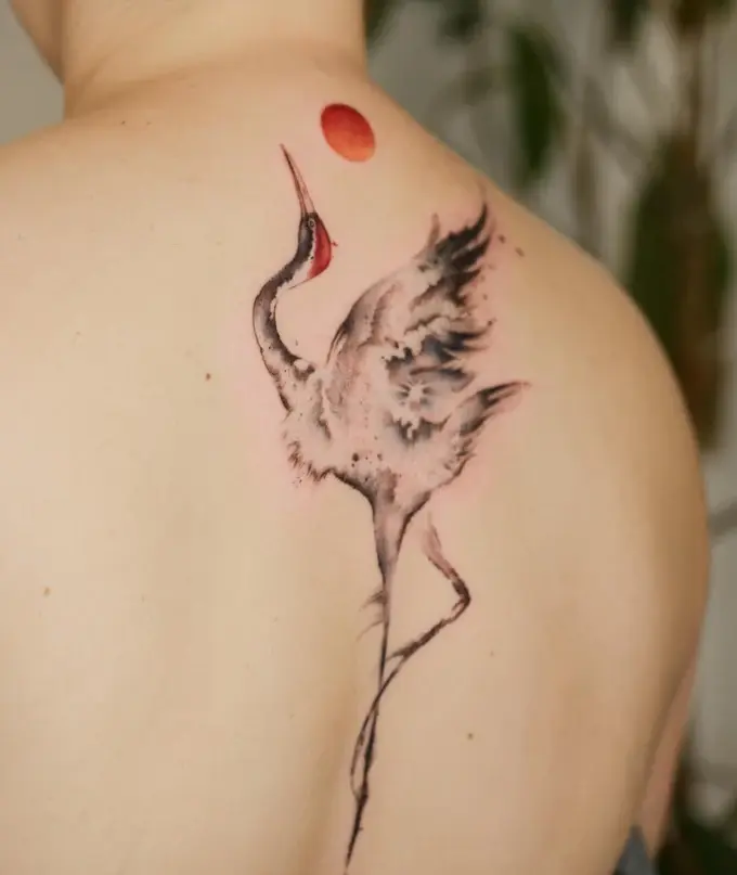 Crane with a red sun