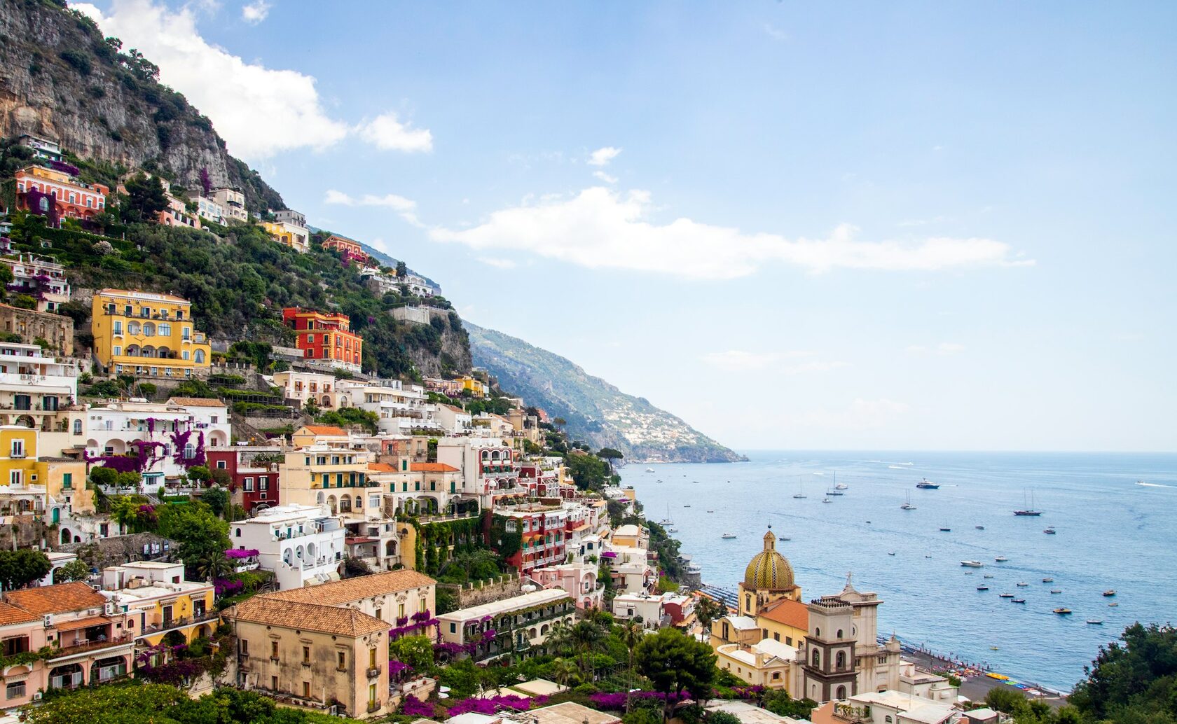 Positano's pastel houses tumbling down the cliff to the sea