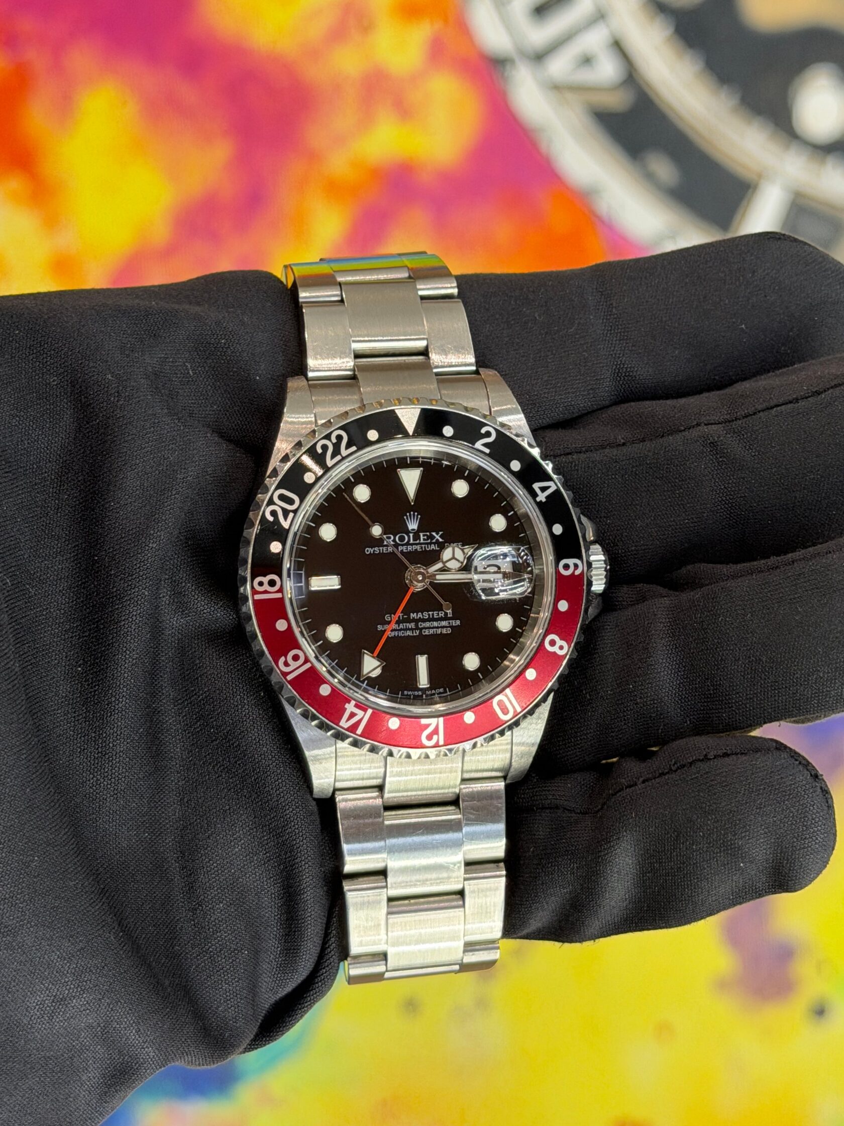 Pre-owned Rolex GMT-Master II with black and red Coke bezel at ChronoMarket Berlin