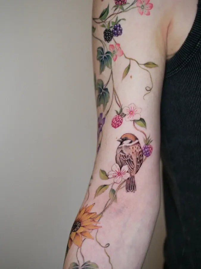 Botanical arm piece with an owl and berries