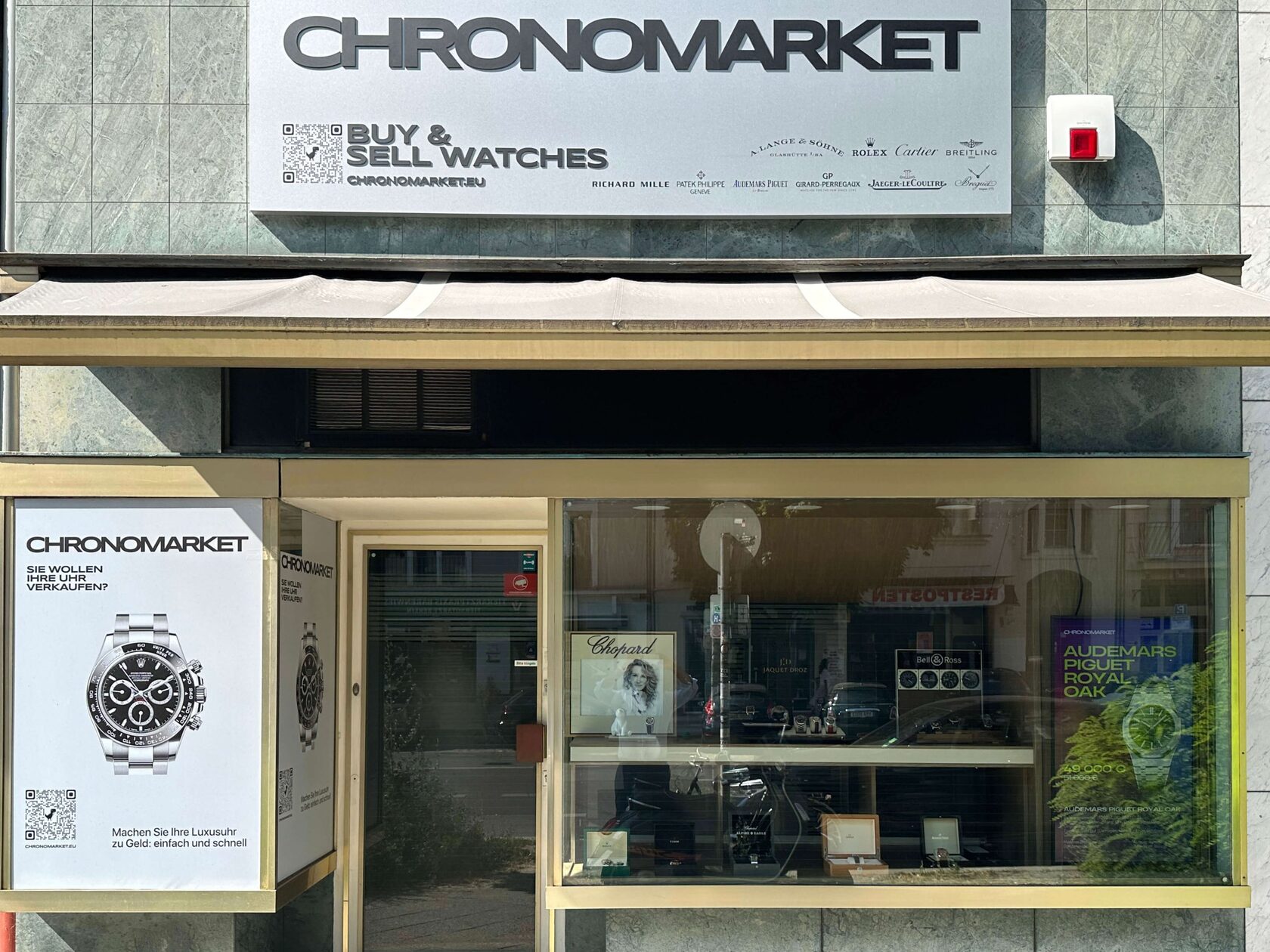 ChronoMarket store front with BUY & SELL WATCHES sign at Uhlandstraße 47, Berlin-Charlottenburg