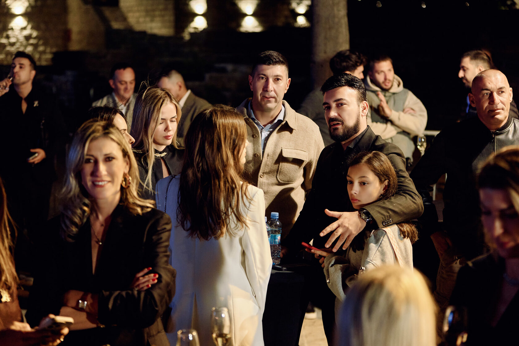 Guests in conversation at the reception