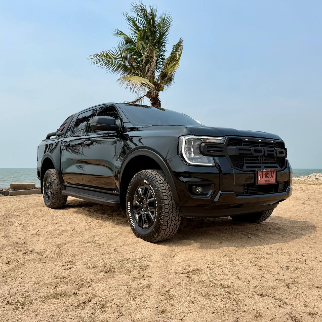 Orange Ford Ranger Wildtrak 2024 – stylish and rugged pickup for rent in Pattaya