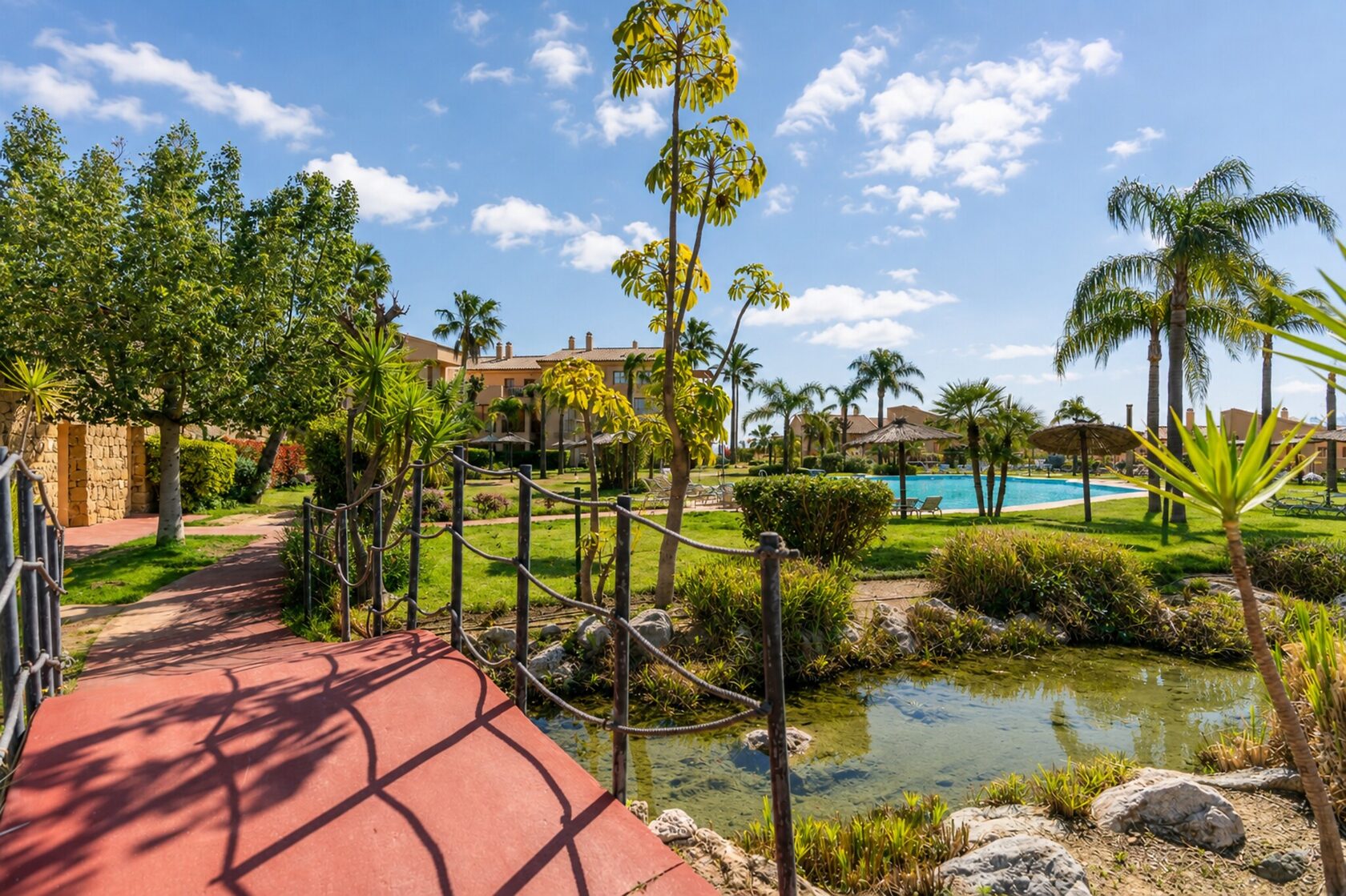 Landscaped gardens with a pond in the grounds