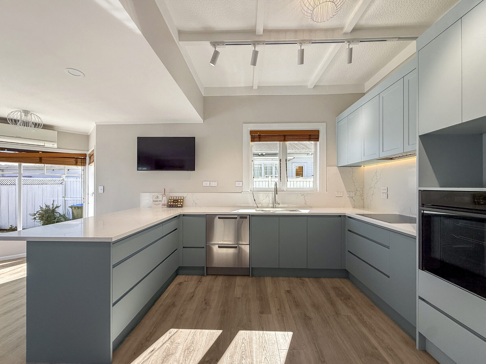 Open view of the renovated Epsom kitchen and adjoining living area