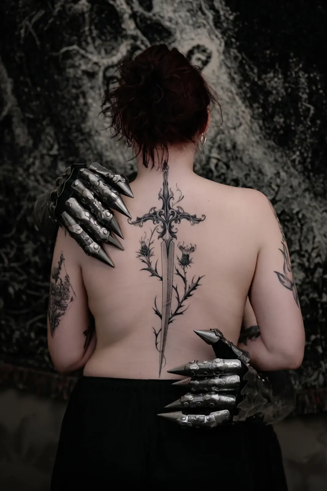 Cross and botanical lines on the back — Sasha