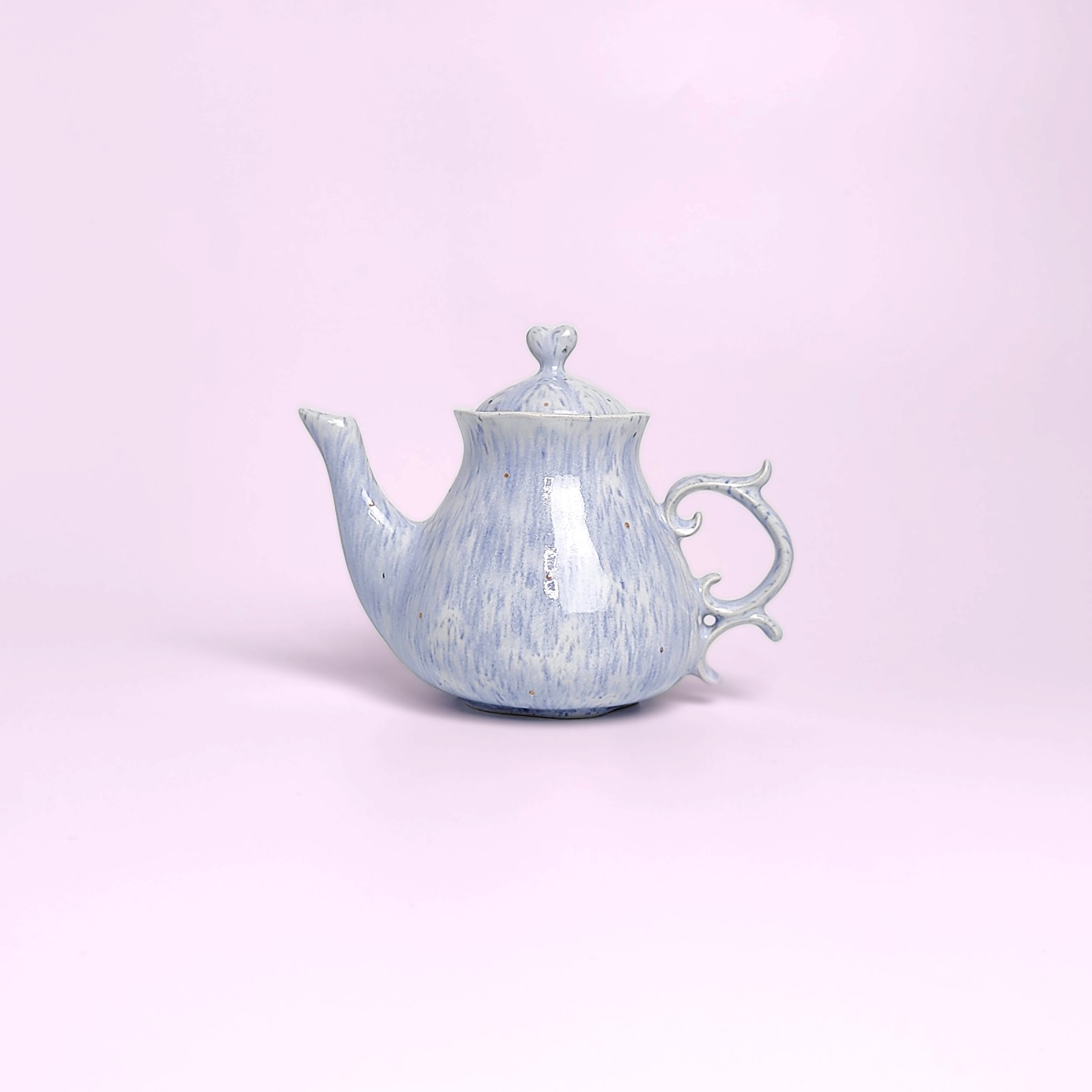 whimsical handmade ceramic tea set in soft blue glaze with forest fairy medallions — an elegant, one-of-a-kind creation