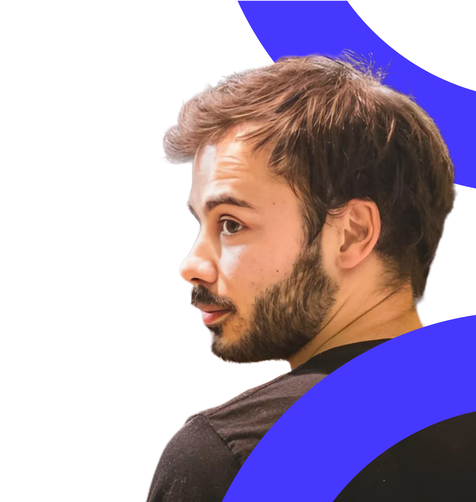 A man with a beard and moustache looks over his shoulder (Hans Lemuet).