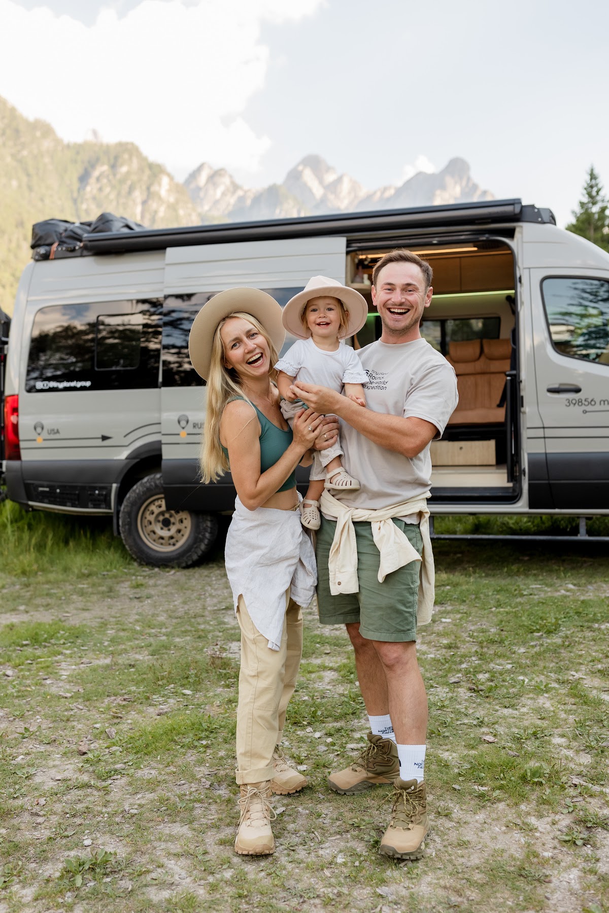 A family by their Tiny Planet van