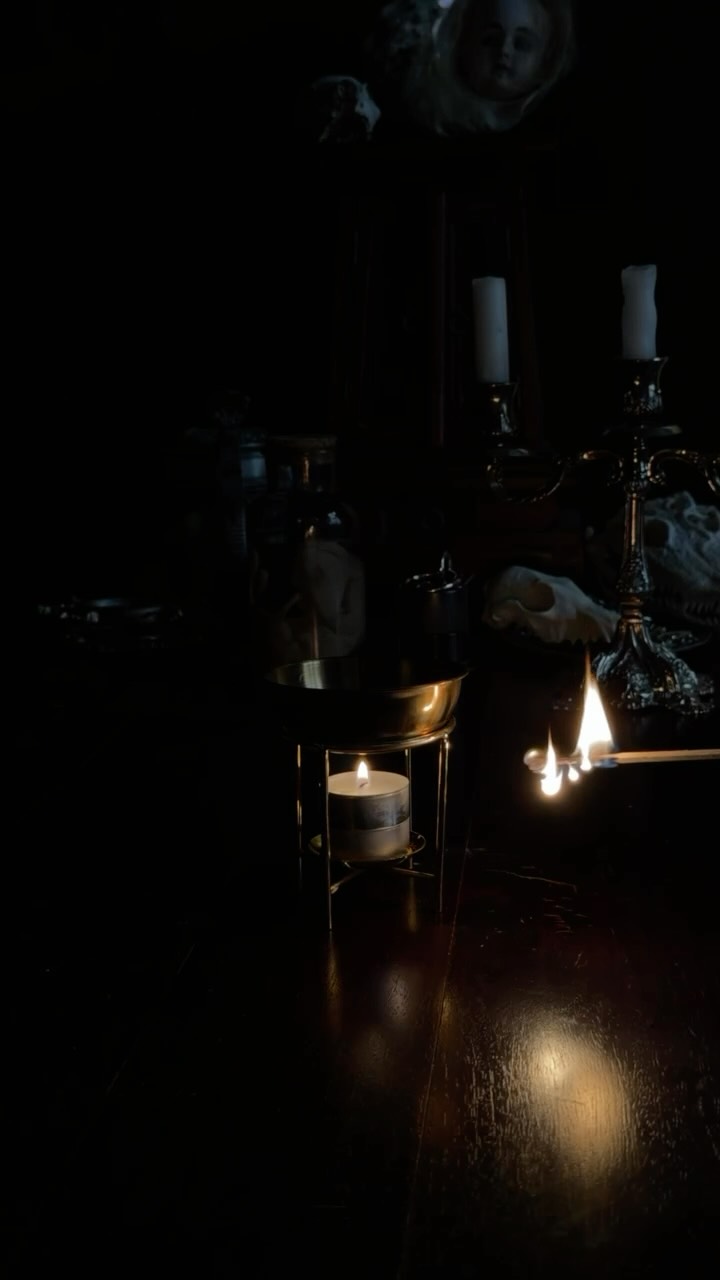 Full photograph of candles, incense and mystical studio details