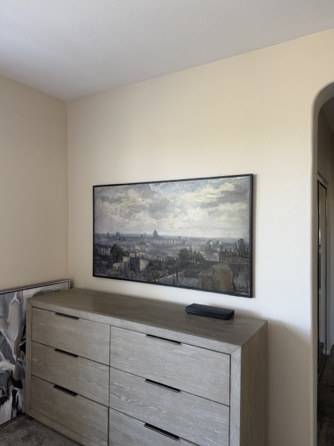 Samsung Frame above dresser