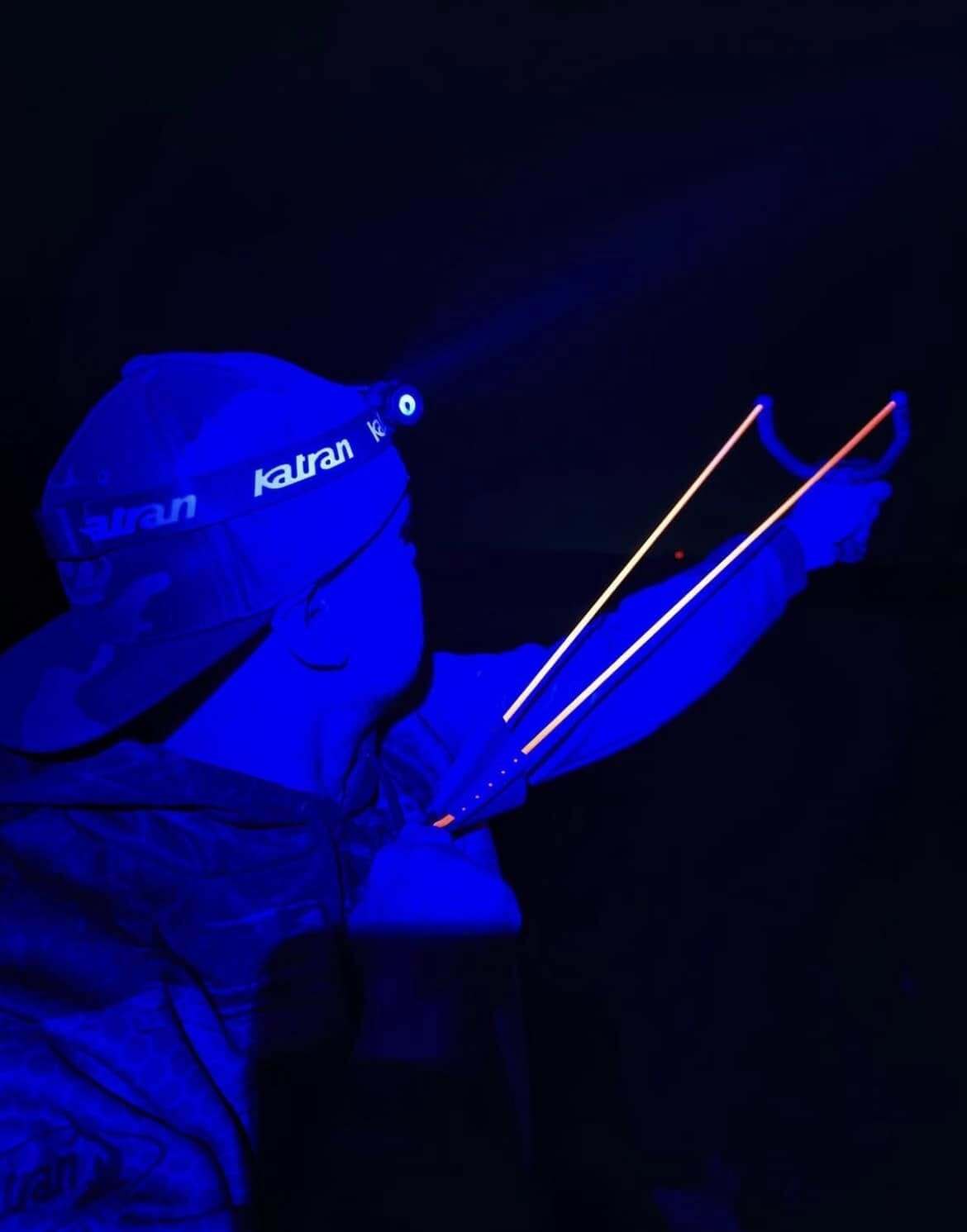 Angler using the Katran W/B 460 PRO headlamp