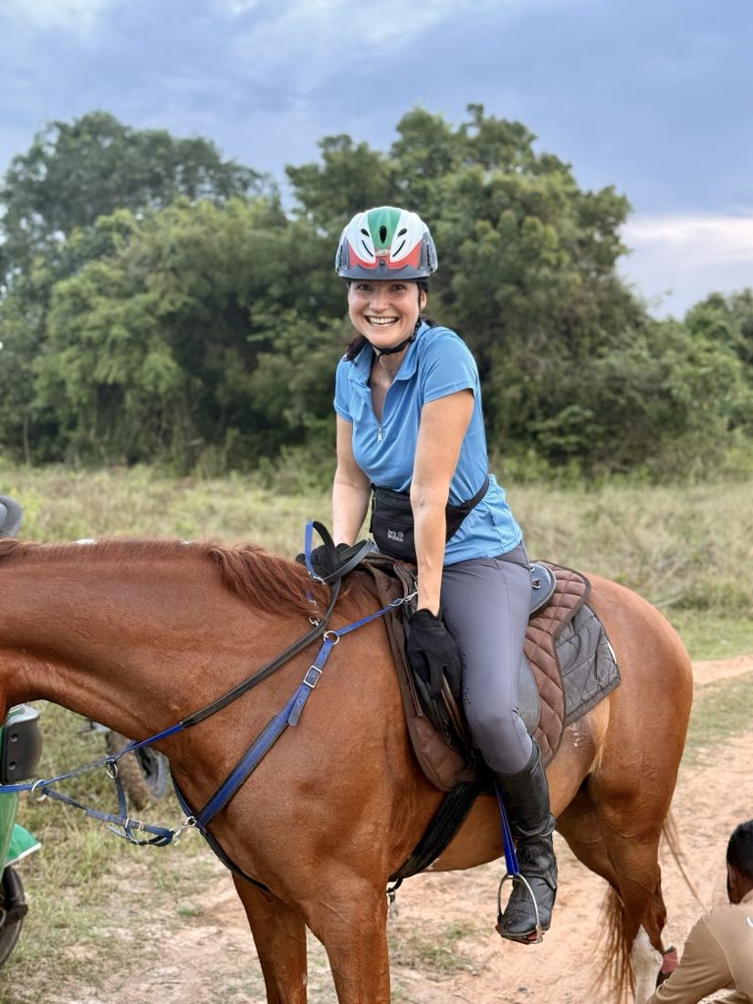Smiling rider on horseback during a private trail ride at Vonfidel Ranch in Sri Lanka