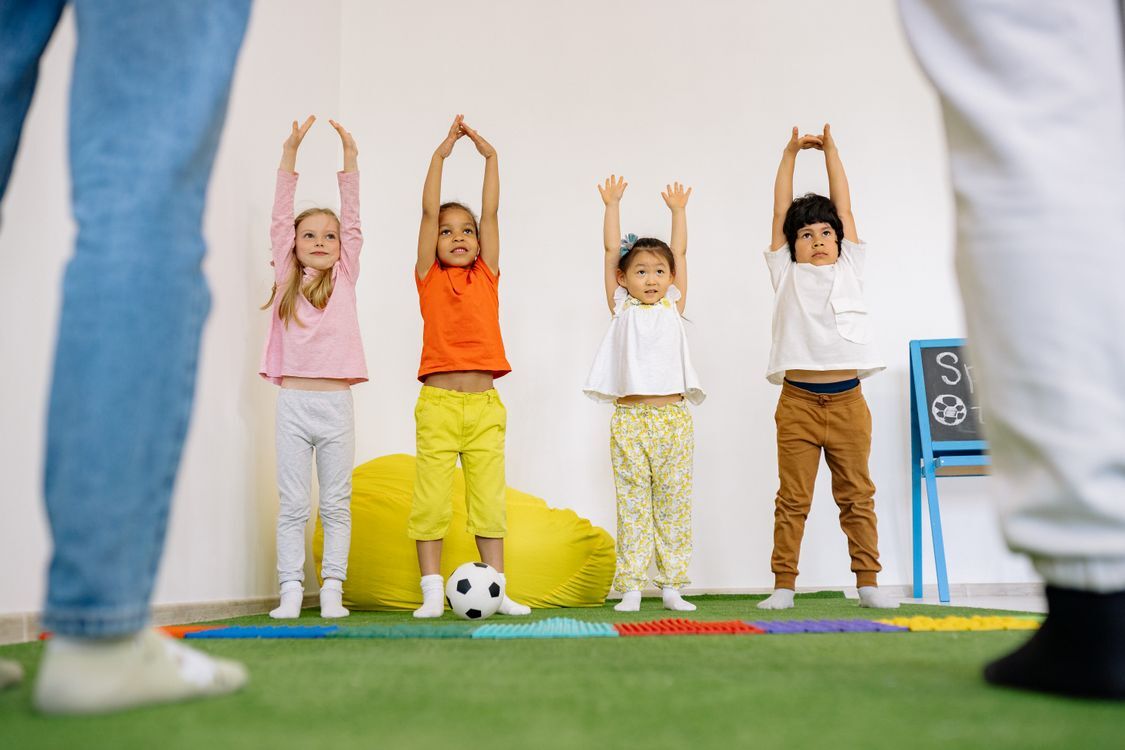 Children enjoying a movement break together in a classroom