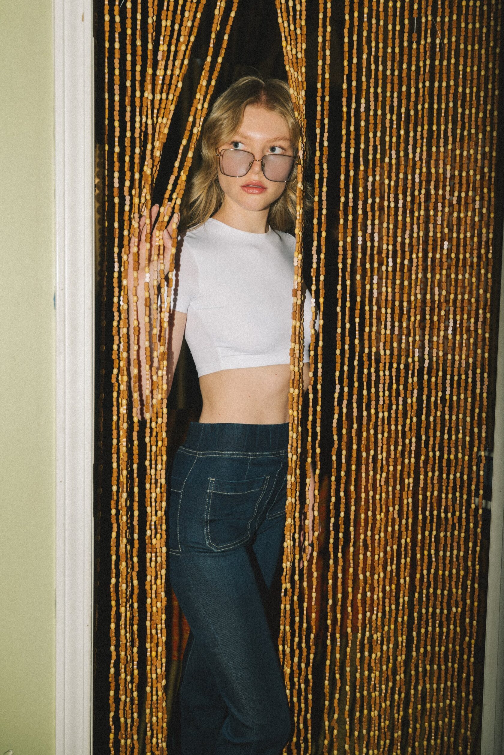 Artemis Vintage Denim lookbook, beaded curtain