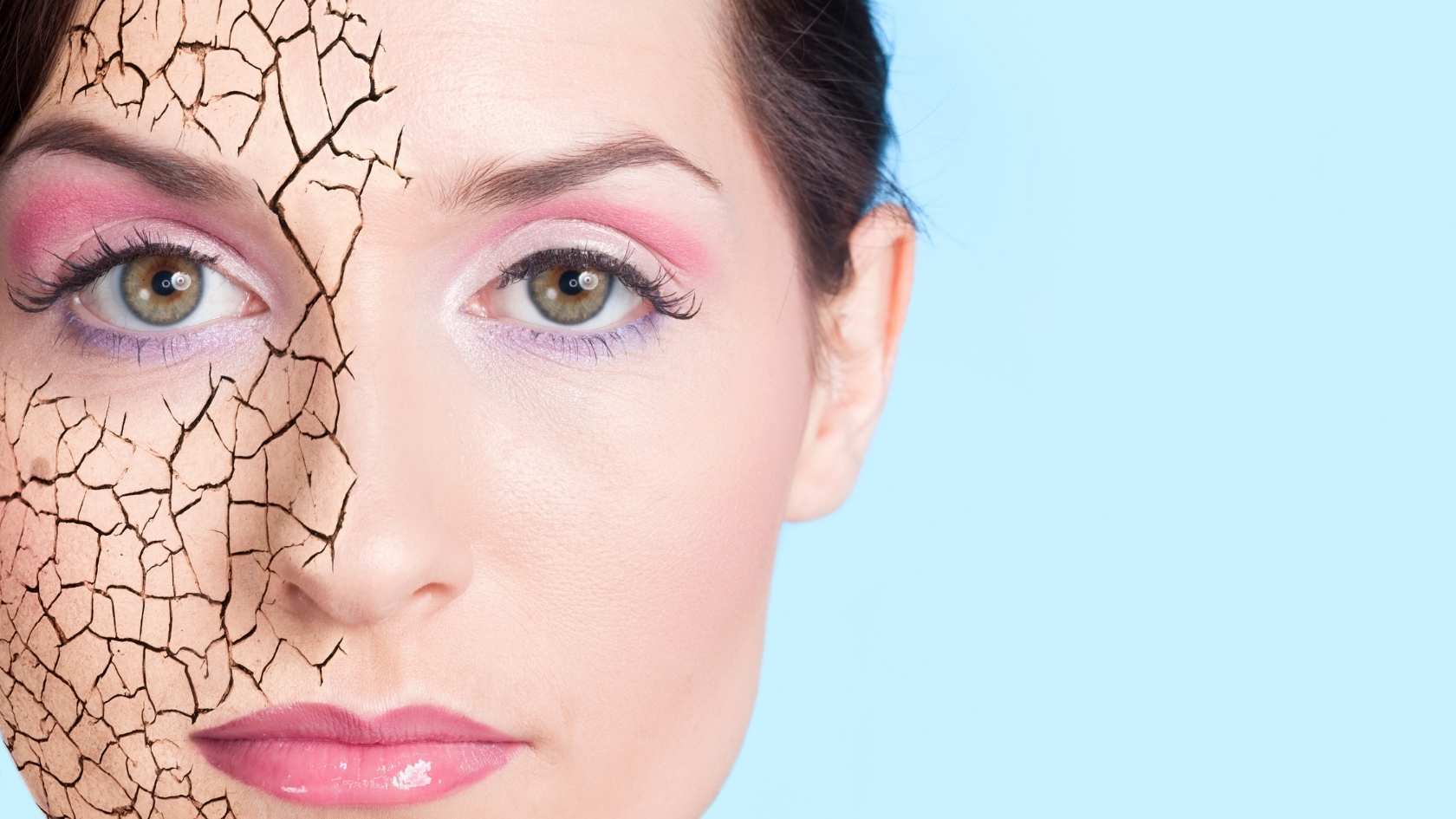 The image shows a woman's face with makeup, where the left side is visually styled to resemble dry, cracked skin — symbolizing severe dehydration or damage to the skin barrier caused by hard water.