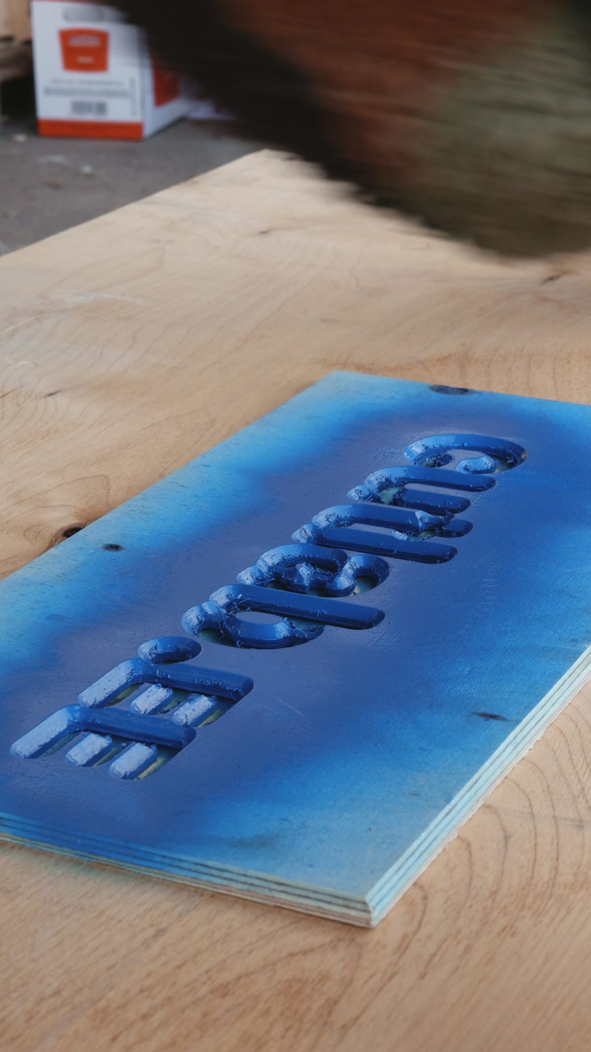 Cutlab stencil on a shipping crate, close view