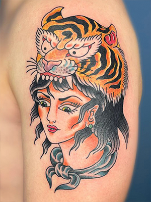 Traditional woman and tiger tattoo