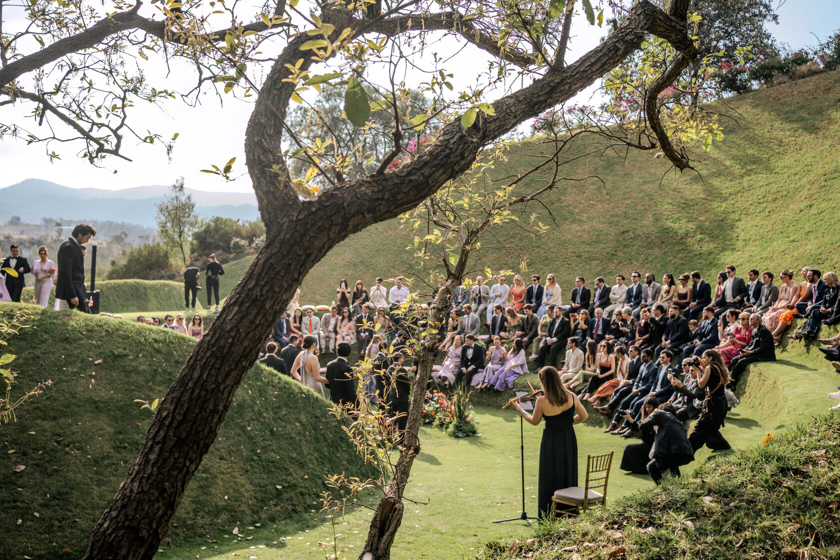 Polina performing live violin during a wedding ceremony in Mexico