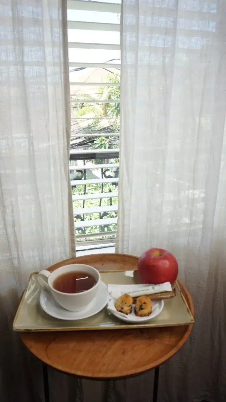 Tea by the window at The Silk Road laser studio, Seminyak Bali