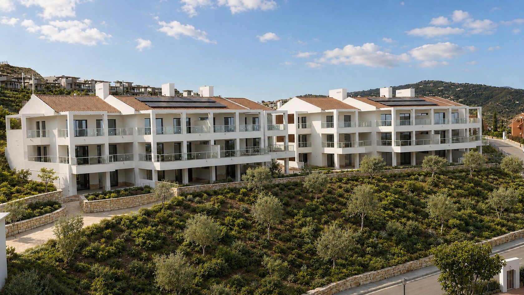 The development stepping down the hillside in the Benahavís hills