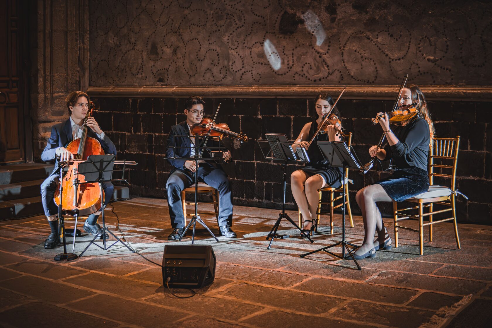 Professional string quartet performing live at a wedding
